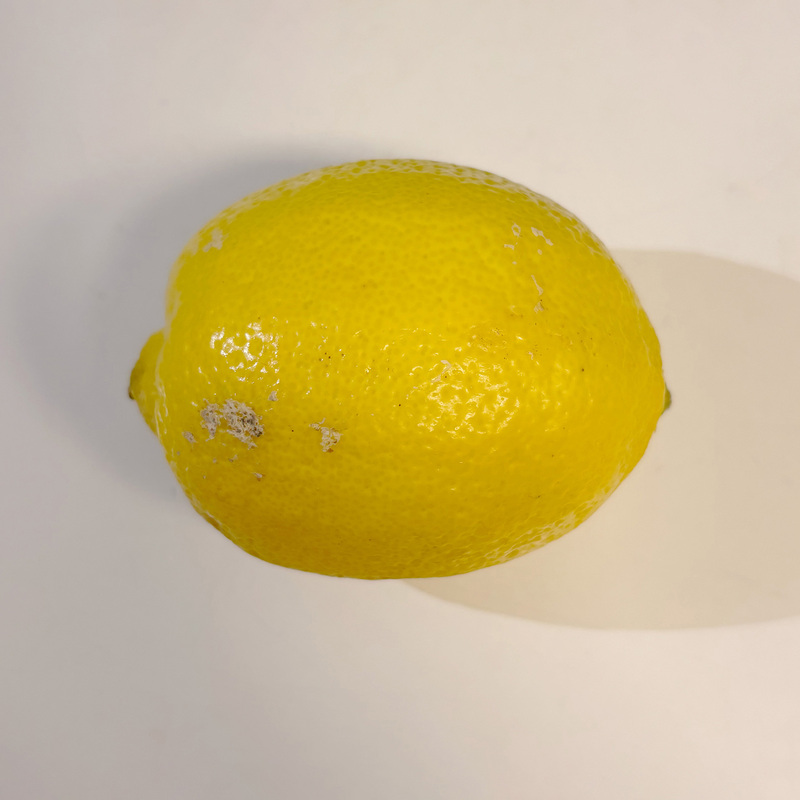 Lemon front view. It can be seen as a sphere, and the pointed corners at the ends can be realized using the extrusion function.Its rough surface needs to be taken care of when modeling.