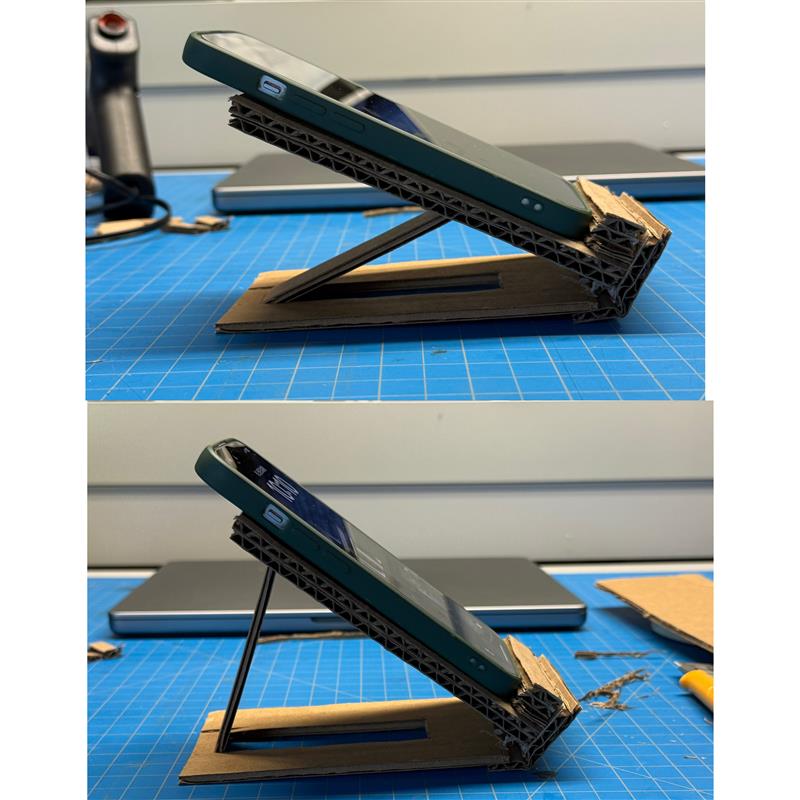 These two images display the final product at different angles, demonstrating the stand’s stability and functionality in various positions.Next, if we continue improving the stand, we will focus on enhancing its stability, especially in the parts that need to be frequently bent. The challenge will be strengthening those areas without affecting usability. We might also explore different assembly methods, such as using interlocking joints instead of glue, or experimenting with alternative materials. Overall, through the Activity 1 workshop, we learned how to build a prototype from scratch, realized that even simple designs can go wrong, and that everything has room for iteration. This was a great starting point for developing prototypes in Project 2.